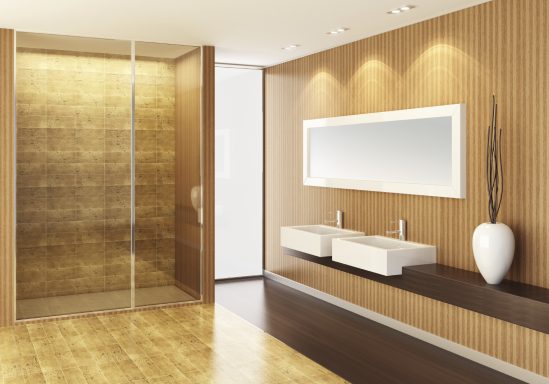 Moderner Badezimmerbereich mit Holzverkleidung, zwei Waschbecken und Glasdusche.