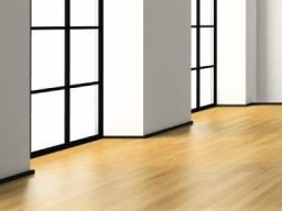 Heller Wohnraum mit hochwertigen Spachtelarbeiten Q4 und modernem Laminatboden. 